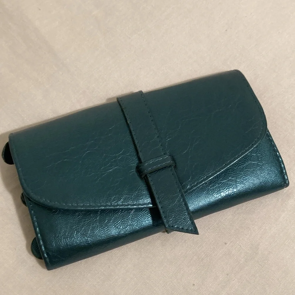 Mele & Co jewelry roll travel case teal blue